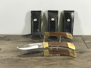 lot 334 image: 3 - Pakistan Stainless Steel Hunting Folding Knives with Sheaths