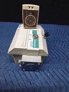lot 49 image: Ecolab Pathways drain treatment dispenser with key and a plug-in timer