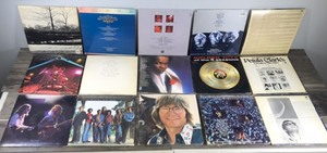 lot 350 image: Lot of Rock & Roll Vinyl Records & More - Steely Dan - Elton John - The Police - John Denver & More
