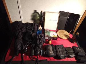 lot 69 image: Smoke alarm, 4 umbrellas, Avon chess pc cologne bottles, and more
