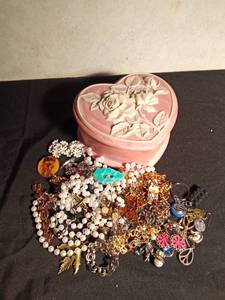 lot 90 image: Heart shaped with rose on top full of jewelry