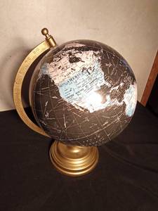 lot 100 image: Black, white and blue globe with metal stand