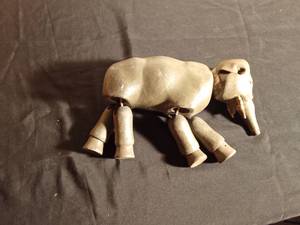lot 118 image: Wooden jointed elephant from the Schoenhut Humpty Dumpty Circus with leather tusks and ear