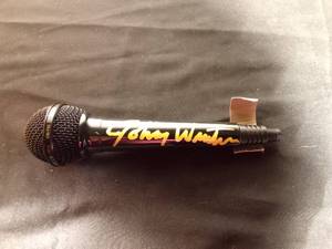 lot 121 image: Microphone with Johnny Winter autograph on it