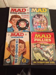 lot 141 image: 1969 35cent #129, 1963 Mad Follies #1 50cent, 1973 Mad Super Special 75 cent, 1997 super special Mad About Families magazines