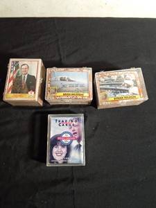 lot 145 image: 2 cases of desert storm trading cards, a case of president trading cards and a case of the Clinton - Lewinsky affair trading cards