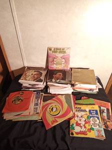 lot 154 image: Childrens and other 45 records including a sealed 45 of A tale of Two Cities