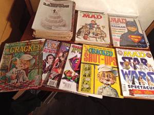 lot 159 image: 1975-1999 Mad magazines including 1989 Batman and 1999 Star wars, 1971-1999 Cracked magazines and National Lampoon magazines and more