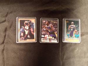 lot 186 image: 3 Kobe Bryant basketball cards in sleeves
