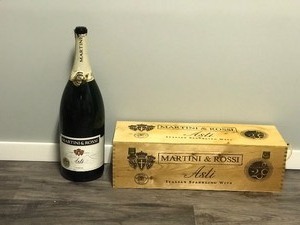 lot 372 image: MILLENIUM MARTINI & ROSSI GIANT CHAMPAGNE BOTTLE EMPTY  WITH WOOD SHIPPING BOX - 22.5 Tall