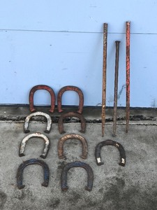 lot 387 image: Horseshoes & Metal Stakes