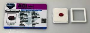 lot 107 image: AGI Labs Natural Rhodolite Garnet 2.80 Cts. Oval Rasberry Pink Garnet (With Card)