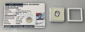 lot 112 image: AGSL Labs Natural Sapphire 5.60 CT. Blue Excellent Chusion Cut (With Card)