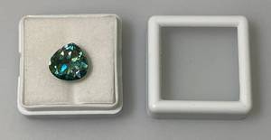 lot 122 image: 3.95 Ct. Lab Created VVS1 Vivid Blue Pear Cut Massonite Gemstone (In Protective Case)