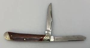 lot 126 image: Vintage Rough Ryder Double Bladed Pocket Knife With Red Bone handle