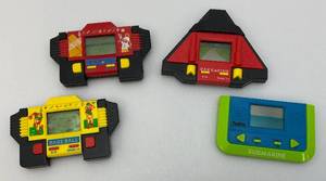 lot 127 image: Misc. Vintage Handheld Electronic Games Including Baseball, Car Racing, Submarine &amp Tennis (Two Missing Battery Covers)