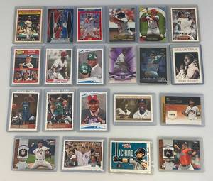 lot 139 image: Misc. Sports Cards Including Rickey Henderson And More (In Protective Sleeves)