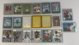 lot 150 image: Misc. Sports Cards Including Joe Montana And More (In Protective Sleeves)