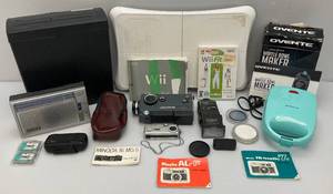 lot 78 image: Misc. Vintage Electronics Lot Including Kodak Instamatic M6 Movie Camera, WII Fit, And More