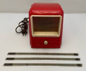 lot 244 image: 1950s Hollywood Toy Television With Slides  Including Woody Carpenter, Andy Circus And Hopalong Stagecoach (Seems To Work)