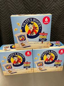 lot 116 image: TN 5 - Pirates Booty Rice & Corn Puffs Aged White Cheddar - 6 Bags