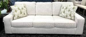 lot 12 image: Sofa Cream Fabric 3-Seat with Green Leaf Pillows