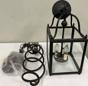 lot 157 image: Black Iron Lantern Pendant Light and a Industrial Style Iron Swirl Light