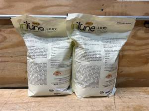 lot 100 image: Bird Feed lot of 2