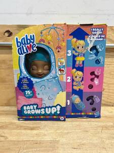 lot 270 image: Baby Alive Baby Grows Up Happy (damaged box)