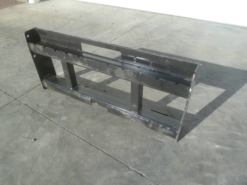 lot 48 image: Wolverine Skid Steer Pallet Fork Back Rack