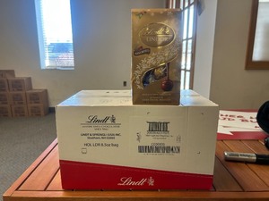 lot 94 image: Lindt Case 12ct Assorted Gourmet Chocolate (MSRP - $138)