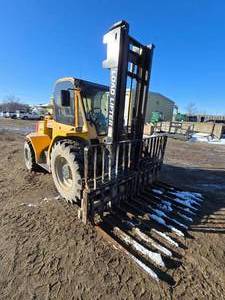 lot 3 image: 2015 Load Lifter 2412-12D 4x4 Tractor Lift w Cab & Heat
