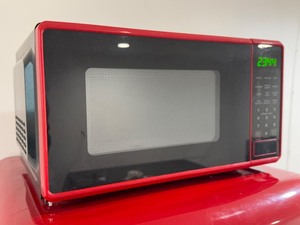 lot 8 image: Mainstays 0.7 cu. ft. Countertop Microwave  Hot Rod Red (700 Watts)