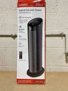 lot 210 image: Lasko 22 Ceramic Tower Space Heater with Remote (black, model CT22495)