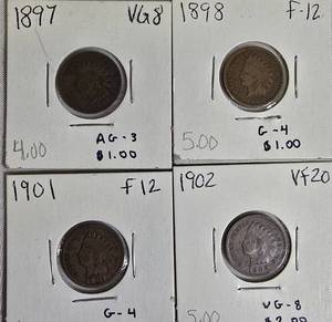 lot 21 image: Indian Head Small Cents from the years 1897, 1898, 1901, and 1902.