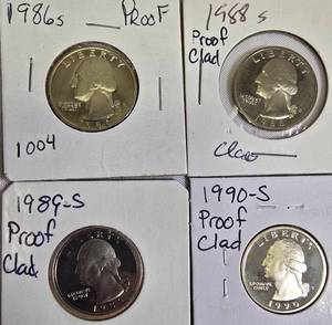 lot 48 image: Proof clad Washington Quarters from the years 1986, 1988, 1989, and 1990.