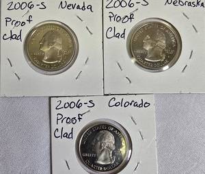 lot 55 image: Proof clad Washington Quarters from the year 2006 from the S mint