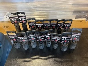 lot 13 image: PowerBuilt - 12 in Drive metric and SAE assorted sockets
