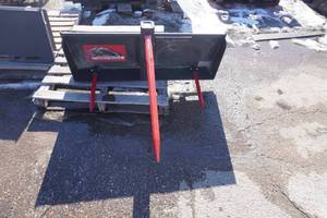 lot 36 image: Brand New Grey Wolf Brand Bobcat Skid Loader Skid Steer Bale Handling Attachment