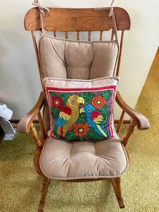 lot 16 image: Wooden Rocking Chair - Cushions and Colorful Parrot Throw Pillow