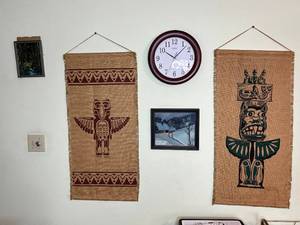 lot 62 image: La Crosse Clock & Tribal Burlap Wall Hangings