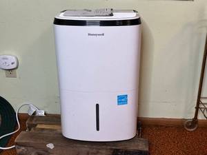 lot 63 image: Honeywell TP70WK Dehumidifier - Energy Star 70-Pint Portable Unit
