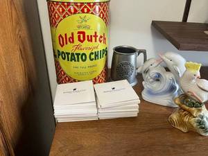 lot 161 image: Holland America Line Memorabilia Set 150 Years Coasters w CoAs, Parrot Statue, Old Dutch Tin