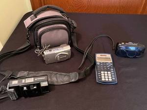 lot 168 image: Minolta Freedom III AF, Freedom II & Multi AF Cameras, Olympus D-550 Zoom, TI-30X IIS Calculator
