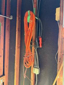lot 214 image: Orange Extension Cords - Heavy-Duty Electrical Cables with Clips