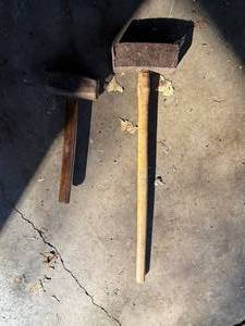 lot 216 image: Two Sledge Hammers with Wooden Handles