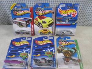 lot 199 image: (EC1) Assorted Hot Wheels in Packag...