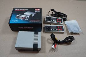 lot 213 image: Mini Game Entertainment System with Games Built-In