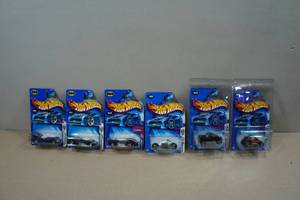 lot 234 image: Hot Wheels - 2004 First Editions - Batmobile, Tomohawk, Hummer