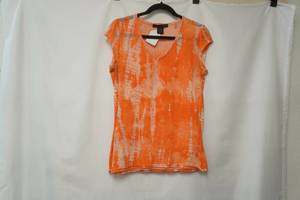 lot 393 image: Calvin Klein Jeans Size M. orange & white shirt